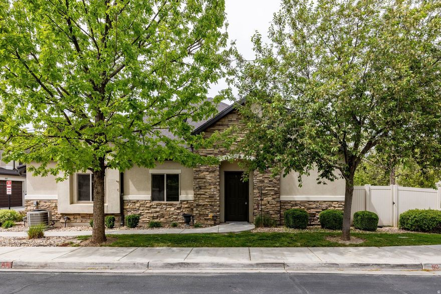 Rare single-level townhome in desirable Valentine Estates, Woods Cross! No-step entry makes this home a true find. Featuring 2 bedrooms, 2 bathrooms, plus an office that easily serves as a 3rd bedroom, attached 2-car garage, and private fenced yard. Freshly painted and move-in ready with all appliances included, fridge, washer, and dryer. The community is peaceful and quiet and amenities include a pool, playgrounds, and direct access to the Legacy Trail for biking, running, and outdoor recreation. Close to top-rated schools with language immersion programs, plus a quick commute to SLC International Airport and downtown Salt Lake City. Perfect for retirees, downsizers, or first-time buyers. Don't miss this rare opportunity, schedule your showing today!