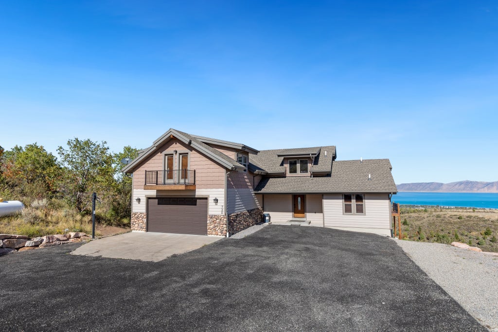 Photo of 730 S BALSAMORHIZA RD, Garden City, UT 84028 (MLS # 2184953)