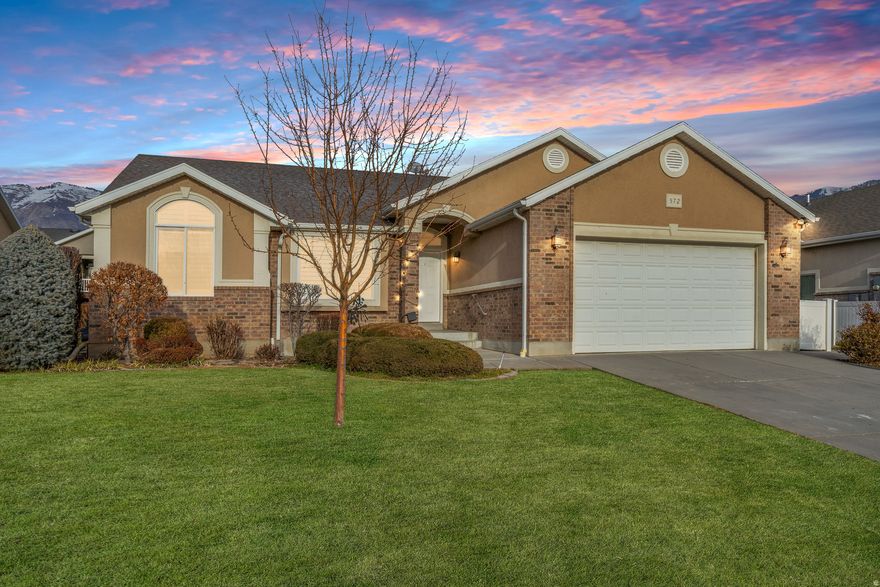 Welcome to effortless living in one of North Ogden's most sought-after communities. This rarely available floorplan offers the perfect blend of comfort, convenience, and serenity - ideal for those looking to simplify life without sacrificing space or style.  Enjoy true maintenance-free living with HOA-provided lawn care and snow removal, giving you more time to relax and explore. Located just minutes from North Ogden Divide, you'll have quick access to world-class skiing, Pineview Reservoir, hiking, biking, and year-round recreation - all while coming home to a quiet, well-kept neighborhood.  Inside, the open-concept layout features a spacious vaulted great room that flows seamlessly into the kitchen and dining area. The kitchen is designed for gathering, complete with a generous island, ample cabinetry, and all appliances included. Step out onto the large, covered deck and take in the breathtaking mountain views - the perfect setting for peaceful mornings or evening dinners outdoors.  Main-level living makes everyday life easy, highlighted by a spacious primary suite with a spa-inspired en-suite bath, double sinks, abundant counter space, walk-in closet, and a relaxing soaking tub. A flexible front room offers the perfect space for a home office or formal sitting area.  Downstairs, you'll find a large family room ideal for entertaining, three additional bedrooms, and abundant storage. The separate walkout entrance provides excellent potential for guest quarters or a future mother-in-law suite.  If you've been searching for a low-maintenance home where you can enjoy peaceful surroundings and more freedom to live the lifestyle you love, this is the one.