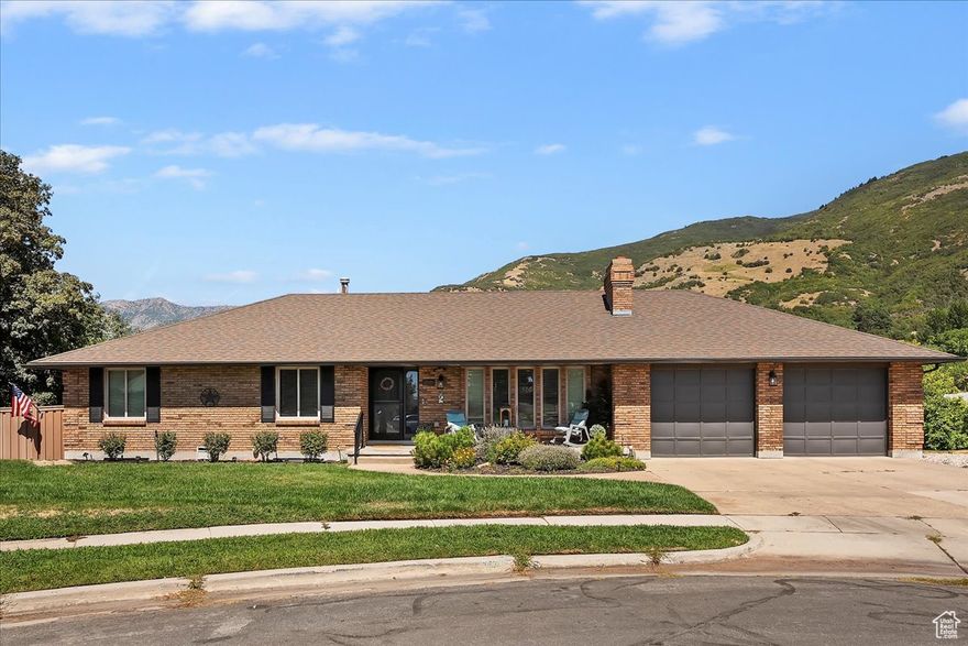 Situated on a peaceful cul-de-sac, this move-in ready home offers the perfect balance of sophistication, comfort, and function. The thoughtfully designed interior features traditional and flex spaces filled with natural light, stunning mountain views, a dedicated home office with built-in wraparound desk/cabinets, a cook's kitchen equipped with granite counters, stainless steel appliances, double-oven gas stove with vented hood, a newly remodeled main level bathroom, and gas fireplace for cozy evenings. The primary suite serves as a private retreat, complete with mountain views, a spa-like bathroom, and generous closet space with custom wood organizers. The walk-out lower level provides tons of storage, bedroom(s), a full bathroom, fireplace, and ample space for a family room, den, play space, or whatever spaces your family is dreaming of. Additional highlights include fresh neutral paint throughout, a full wired security network, solar tubes for tons of natural light, water softener, bonus parking space, and a heated oversized garage with built-in workshop-all contributing to the home's overall appeal. Step through the French doors to a large, covered deck ideal for entertaining or relaxing year-round. It overlooks an oversized, fenced backyard with no rear neighbors and backs the wooded Kays Creek Reservoir area, offering incredible views and true privacy. The yard is supported by a full in-ground irrigation system and secondary water, making outdoor maintenance both easy and efficient. Outdoor living is everywhere with a short drive to some of the most popular trailheads, Snowbasin Resort, or walking distance to the Kay's Creek Trailhead. Close to excellent shopping/dining and SLC, the home is in a family-friendly community near top-rated schools. This exceptional property delivers both elegance and livability in one of the area's most desirable locations.  There is a cat in the home, it will be there for showing just hiding  it is not people friendly please leave alone. All property information, boundaries and documents to be verified by buyer.