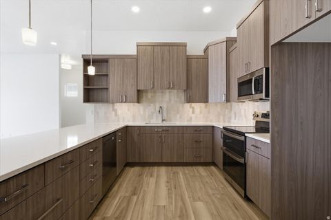 Tiny photo for 6739 W JUDYS FARM LN #6, West Valley City, UT 84128 (MLS # 2154765)