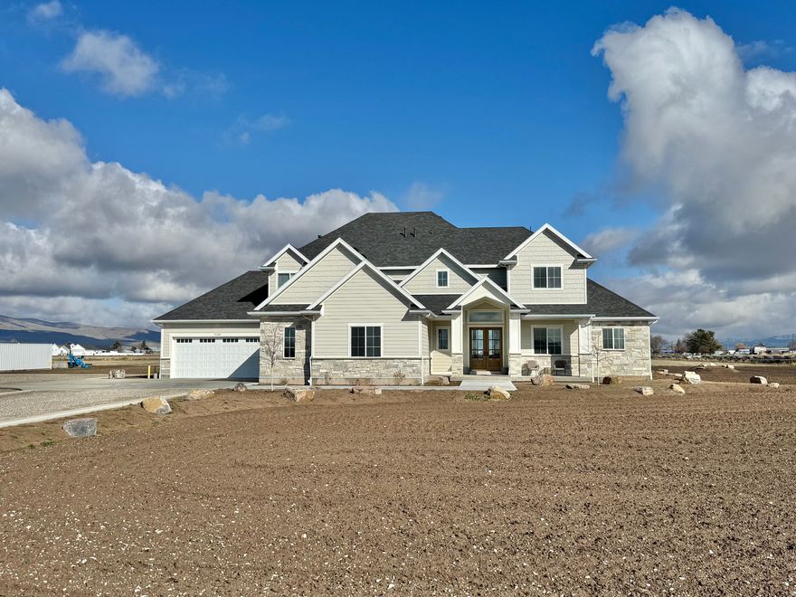 Luxury Country Living on 4.31 Acres  Packed with Premium Upgrades  Experience the perfect blend of luxury, comfort, and functionality with this incredible custom home situated on 4.31 acres of peace. Designed with quality and convenience in mind, this property features high-end upgrades throughout and plenty of room for hobbies, recreation, and future expansion.  The spacious home includes a true 4-car garage that is fully insulated and heated, perfect for year-round use. Inside, modern comforts abound including two washer and dryer setups, a whole-home recirculating hot water system with dual 50-gallon water heaters, and foam insulation for maximum efficiency and quiet living.  The luxurious master suite is a private retreat featuring soundproofing, a 5.1 surround sound system, and a stunning spa-style bathroom with a double shower and a jetted tub with lights and air bubble massage for the ultimate relaxation experience.  This home is also thoughtfully designed for technology and convenience with six televisions included, Starlink high-speed internet, and the home pre-wired for security cameras. Outside, the property shines with Jellyfish permanent lighting installed on the front and sides of the home, perfect for holidays or year-round ambiance.  The property is built for efficiency and durability with a fully encapsulated crawlspace, water softener, and a private well supported by a 2,000-gallon reserve tank. For those needing workspace or future expansion, the property includes a 2-lb gas line stubbed and ready for a future shop.  With room to roam, modern infrastructure, and luxury finishes throughout, this property offers a rare opportunity to enjoy country living with every modern convenience already in place.