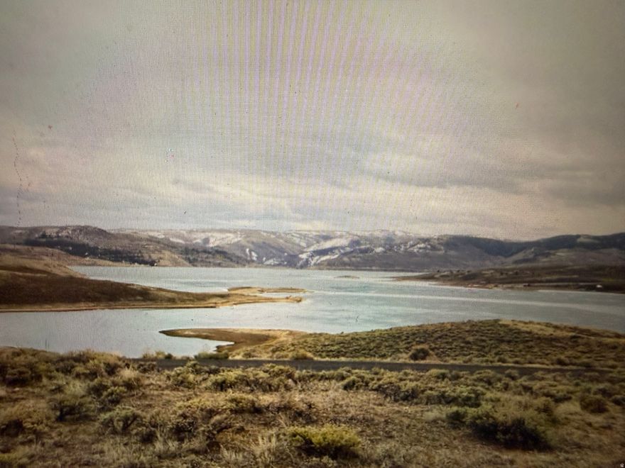 Don't miss this opportunity to build your second home or cabin on this large private lot with stunning views. The property is approximately 250 yards from  some of the best fishing in Utah  and about 5 minutes to the Marina.   The Seller has building plans that were previously approved by both the City and the HOA. Utilities are stubbed to the property.