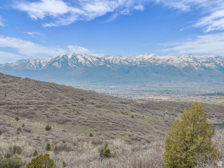 Discover your perfect mountain retreat at Lot 1364 in prestigious Timber Lakes. This exceptional homesite features a ready-to-use cut-in driveway and stunning views. Development-ready with completed Perc Test, Feasibility Letter, and building plans already included with MLS listing. Nestled in a private, gated year-round mountain community, this premium lot offers the ideal canvas for your dream mountain home. Timber Lakes residents enjoy exclusive access to dedicated picnic and recreation areas, miles of adventure-ready 4WD/ATV trails, and private winter access to nearly 3 million acres of national forest-perfect for snowshoeing and snowmobiling enthusiasts. Infrastructure advantages include a private pressurized water system with power available at the site (water and power hook-up fees apply; HOA fees do not include water). Building setbacks ensure privacy and optimal home positioning. The location offers an unbeatable combination of natural seclusion and convenient access to world-class recreation: 108 holes of championship golf, premier fishing, year-round water activities at nearby reservoirs, and exceptional skiing/snowboarding-all within easy reach. Just one hour from Provo or Salt Lake City and only 40 minutes to Park City! Visit www.TimberLakesUtah.com for comprehensive construction guidelines. All photos were taken directly from the property. Don't miss this exceptional opportunity.