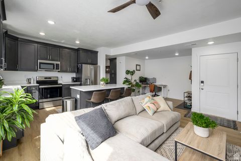 Photo of 8345 S IRIS LUMI LN #304, Midvale, UT 84047 (MLS # 2112501)