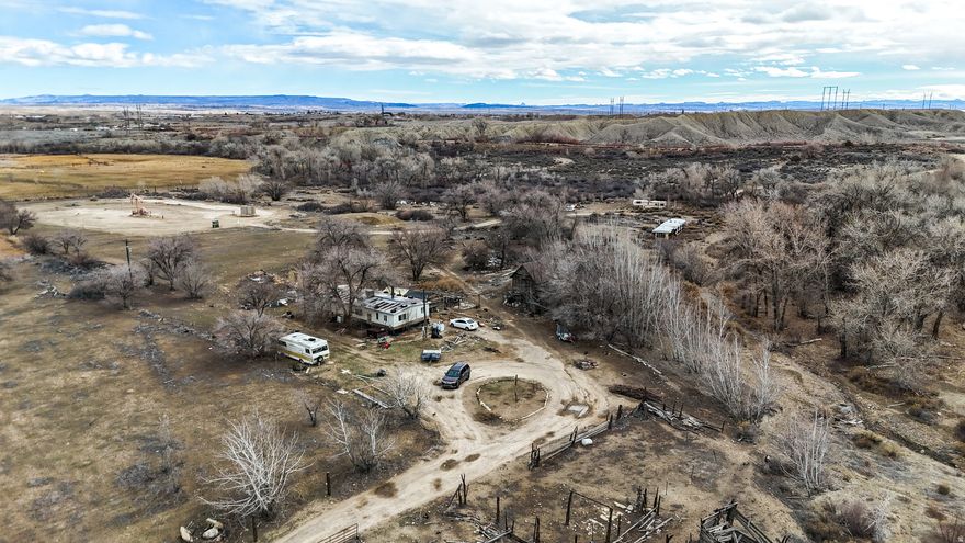 MULTIPLE OFFERS RECEIVED. HIGHEST AND BEST DUE BY 5:00 PM, FREBRUARY 24, 2026. Imagine the endless opportunities offered with a 3 bed, 2 bath manufactured home in a peaceful, private setting, ready for renovation and your personal touch. Situated on slightly over 16 acres at the mouth of Huntington Canyon, with beautiful mountain views to the west and Huntington Creek running through the property. Perfect for horses, etc. Includes 14 shares of Joe's Valley Class B water for secondary irrigation, and mineral rights are included. The property features a historic pioneer cabin with power and a modern bathroom, plus the old mill building offers excellent storage or utility space. After a day of work or recreation, unwind and relax in the hot tub while taking in the surrounding scenery. 3 bed, 2 bath manufactured home in a peaceful, private setting, ready for renovation and your personal touch. Situated on 16 acres at the mouth of Huntington Canyon with beautiful mountain views to the west and Huntington Creek running through the property. Includes 14 shares of Joe's Valley Class B water for secondary irrigation, and mineral rights are included. Property features a historic pioneer cabin with power and a modern bathroom, plus the old mill building offers excellent storage or utility space. After a day of work or recreation, unwind and relax in the hot tub while taking in the surrounding scenery. Set up for propane. Square footage figures are provided as a courtesy estimate only.