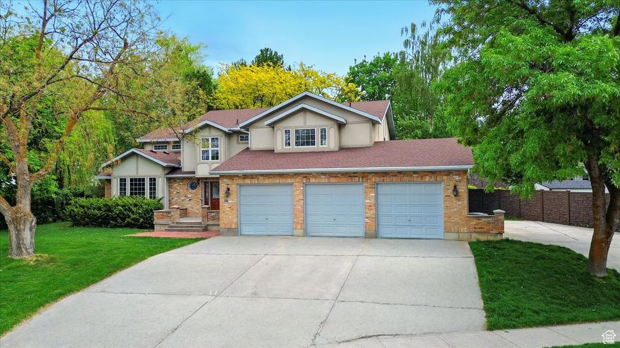 Wow, this well cared for 2 story home on Smithfield's East bench could be your next home! On the main level you'll find large living spaces, a kitchen with beautiful oak cabinets and updated stainless steel appliances in the eat-in kitchen and a large dining room. On the second level, 4 generously-sized bedrooms bedrooms with lots of built in storage are perfect for the next owner. In the walkout basement, 3 more bedrooms and another large family room with lots of space for storage mean there's space for everyone. Outdoors, you'll love the new trex deck, large workshop/shed, outdoor brick oven, and fish pond all surrounded by mature trees for privacy. With too many updates to mention, you have to stop in for a showing to see this homes grandeur for your self.  Buyer to verify all information.