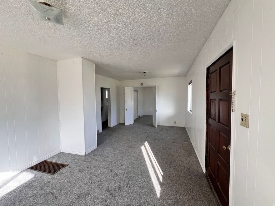 Discover fresh updates throughout this comfortable 4-bedroom, 2 bathroom home. Recent improvements include: Brand new carpet, new vinyl flooring, and a beautifully remodeled bathroom featuring a new tub, cultured marble surround, new window, and a new sink and vanity. The fully fenced yard now match property lines as a survey was completed. The rear patio area is covered perfect for outdoor living. This is a great opportunity to enjoy a home with meaningful upgrades completed since it was last available for sale.   Square footage figures are provided as a courtesy estimate only and were obtained from county records. Acreage was obtained from survey done in 2025. Buyer is advised to obtain an independent measurement and verify all listing information.