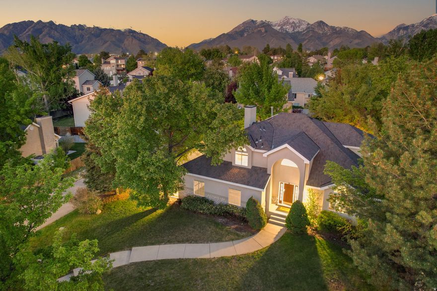 Exceptionally Elegant Two-Story Home with Finished Basement and Sunroom! Located in the highly sought-after Canyons School District with top-rated schools, this 5 Bed, 3.5 Bath residence ensures quick access to desirable venues and daily conveniences, such as cafs, restaurants, Silicon Slopes (major tech employers and business parks), ski resorts, libraries, sports complexes, Bell Canyon Trail, South Towne Center, Lone Peak, and Dimple Dell Regional Park. Nestled on a 0.26-acre cul-de-sac lot within this quiet and friendly community, the move-in ready home exudes sophistication with a grand covered entrance, mature landscaping, and a two-story foyer. Tastefully finished with neutral tones, the interior features hardwood floors, soft natural light, durable tile floors, cozy living room, and a fireplace family room. Entertain in the upgraded gourmet kitchen, which has newer stainless-steel appliances (2022), granite counters, gas stove, center island, and dining area. Host friends in the luminous newer sunroom (2022), or opt to gather in the basement rec room. Two bedrooms and one full bathroom complete the fully-finished basement. Relax in the oversized primary bedroom with tray ceilings, double walk-in closets, and an en suite boasting a jetted tub, dual sinks, and a separate shower. Two upper-level bedrooms and a full bathroom afford unparalleled comfort. Other features: 2-car garage w/epoxy floors, RV parking, laundry room with sink and clothing rack, swing set, fenced backyard, newer roof (2018), and more! Don't miss this opportunity-schedule your own private showing today!