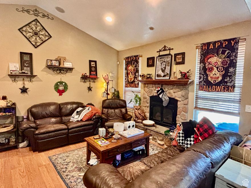 PRICE REDUCED! This beautiful 4-bedroom, 4-bathroom home is located in a quiet cul-de-sac and offers a spacious layout with vaulted ceilings in the main floor great room and a basement apartment, perfect for guests or rental income. Two of the bedrooms on the main floor have been combined but could easily be converted back to make this a 5 bedroom home. The basement kitchenette could easily be converted to a full kitchen. The large, fully fenced backyard provides privacy and includes an hot tub with scenic views. Ideally situated less than 10 minutes from Thanksgiving Point, Lehi and Saratoga Springs shopping, and the new Primary Children's Hospital, with quick access to I-15 via Lehi Main Street and Pioneer Crossing in under 5 minutes. Meadow Elementary is also just a short walk away via a convenient walking path, making this home the perfect blend of comfort, location, and lifestyle.