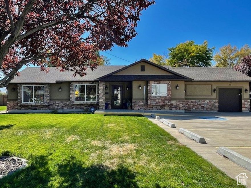 Conveniently located at the corner of 4500 S and Main Street. Zoned: RNB. This space is currently setup as office space and has a large open area that can accommodate multiple desks or cubicles, one large private office, a large conference room, kitchen/break room and work shop. The RNB Zone can be used for many types of businesses. Dr. Office, Dentist Office, Real Estate Office, Title Company, Property Management Company, Sandwich Shop, Barber Shop, Massage Therapy, Coffee Shop, Small School, Aesthetician Studio, as well as many other small businesses. Square footage figures are provided as a courtesy estimate only. Buyer is advised to obtain an independent measurement.