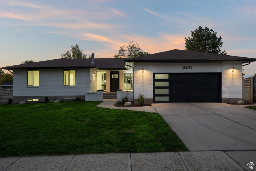 This stunning, fully renovated home is located just minutes from the prestigious Willow Creek Country Club, nestled in one of the most desirable pockets of the Salt Lake Valley. With breathtaking mountain views, a spacious layout, and designer finishes throughout, this property is a rare find.  Boasting over 4,000 square feet, the home features six bedrooms, including a fully finished basement with a separate kitchenette, perfect for entertaining, extended guests, or multigenerational living. The heart of the home is an expansive great room with soaring ceilings and exposed beams, creating a dramatic and inviting space for gatherings. The kitchen is one of the largest you'll find, completely reimagined with luxury in mind and equipped for everything from quiet mornings to hosting a crowd. A spacious butler's pantry offers added storage and prep space, ideal for those who love to cook or entertain.  Step outside to enjoy a lush green yard with room to relax, play, or garden, all surrounded by mountain beauty.  Opportunities like this in the Willow Creek corridor are rare. Schedule your private showing today.