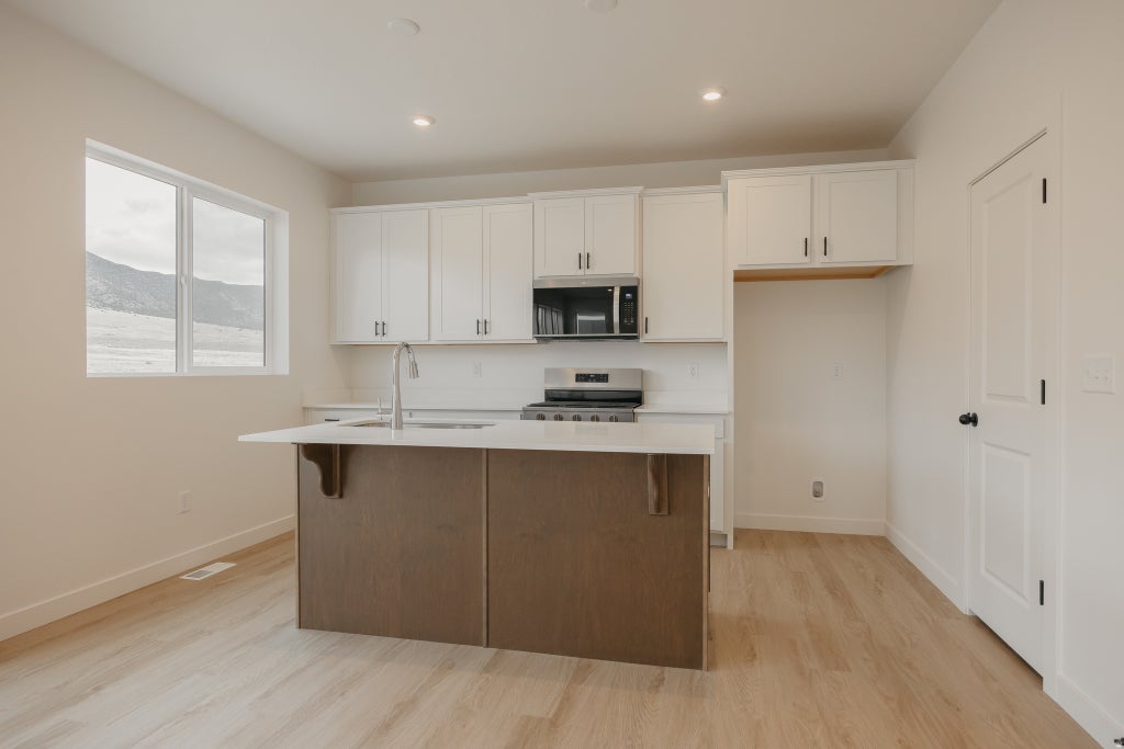 Photo of 3634 N EAGLE MEADOW DR #308, Eagle Mountain, UT 84005 (MLS # 2170578)