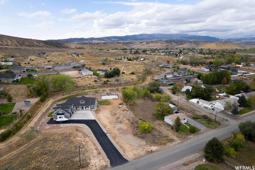 A stunning .43-acre parcel of land with mountain and valley views is waiting for you. This land offers ample space for your dream custom home. We encourage all buyers to verify this information to ensure everything aligns with your vision. Don't miss out on this fantastic opportunity!