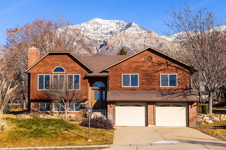 North Ogden Bench Home with VIEWS! This beautiful 4-bedroom, 3-bath home showcases mountain views and a bright, open layout enhanced by vaulted ceilings. Multiple living spaces-including a living room and a separate family room/game room-offer flexibility for both entertaining and everyday relaxation. Set on a generous .39-acre lot, (with AMAZING backyard views of Ben Lomond Peak), the spacious yard features mature landscaping, a large storage shed,  and room for the kids to play or room for a garden. Enjoy seamless indoor-outdoor living with walk-out access from the kitchen to a deck ideal for gatherings, as well as a large private patio off the primary bedroom. The oversized two-car garage includes a workshop area, making this home as functional as it is inviting. HOA includes 17 acres of green areas and parks, walking pathways,  Gazebo (available for reservation), Tennis Court, Playgrounds, Basic Expanded Cable TV and Internet Package and Socials throughout the year.  HOA is $87 per month, paid quarterly ($260) Schedule your private showing today! Square footage figures are provided as a courtesy estimate only and were obtained from tax data.  Buyer is advised to obtain an independent measurement.