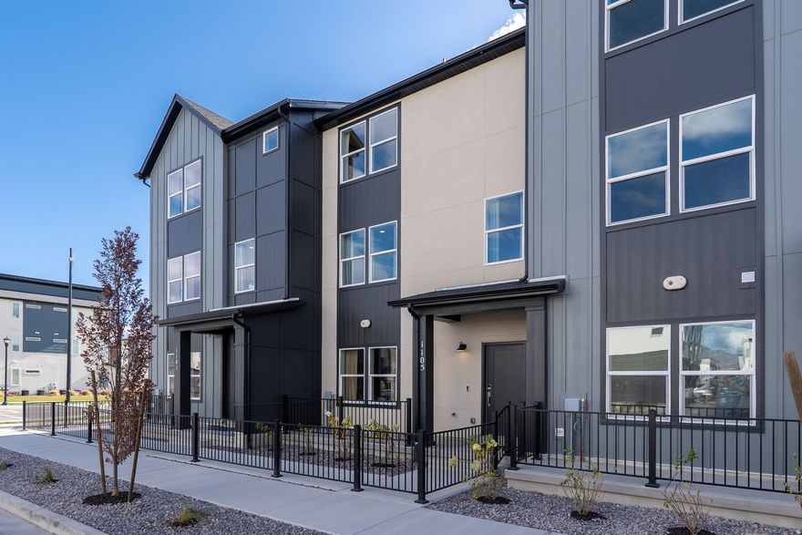 The three-story Manhattan townhome plan offers up to 2,163 square feet of inviting living space in American Fork and is estimated to be completed in March. The first floor features a large bedroom with a separate full bathroom, ideal for guests or multigenerational living. The second floor includes an open great room, dining area, and a well-appointed kitchen with a center island featuring cabinetry on the backside, a walk-in pantry, and a conveniently located powder room. The primary suite is located on the third floor and offers a walk-in closet and en suite bathroom, along with two additional bedrooms. The home includes a dual-zone HVAC system and is located near the FrontRunner and I-15 freeway.