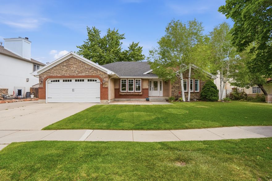 Come see this stunning 6-bedroom, 4-bathroom rambler nestled in one of Murray's most sought-after locations! One level living and a kitchen that is so beautiful you won't stop talking about it.  This spacious home offers incredible versatility with 3 bedrooms on the main level and 3 bedrooms downstairs, plus a formal living room, formal dining room, and two generously sized family rooms, perfect for entertaining and everyday living. The main floor was completely remodeled just 3 years ago, featuring a brand-new kitchen, fresh LVP flooring throughout, and a newer roof, giving you all the charm of an established neighborhood with the feel of a modern home. Water heater replaced 6 months ago.  Step outside to a flat, nicely sized yard shaded by a gorgeous mature tree, plus a 2-car garage and coveted RV parking on the side. The location truly can't be beat - just 5 minutes from freeway access, steps away from the Jordan River Parkway trail system, and minutes from a fantastic golf course. This one checks every box - don't miss it!   Other features: hot tub hookup in the backyard, quartz countertops, updated lighting throughout the home, water softener, covered storage area on the side of the house, large pantry, & a super fun stage downstairs for kids to play on.  Square footage figures are provided as a courtesy estimate only and were obtained from County Records.  Buyer is advised to obtain an independent measurement.