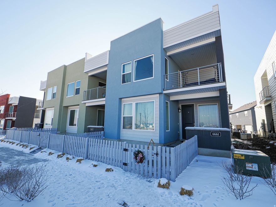 This beautifully upgraded modern townhome is perfectly situated in the heart of Daybreak, offering both style and convenience. Designed for indoor-outdoor living, it features two covered decks plus an additional patio-ideal for entertaining, relaxing, or enjoying mountain sunsets year-round. The central location puts you just steps from Daybreak's newest restaurants, shops, and theaters, with the new baseball field nearby adding to the vibrant community atmosphere. With sleek finishes and thoughtful upgrades throughout, this home delivers modern living at its best in one of Utah's most sought-after neighborhoods.