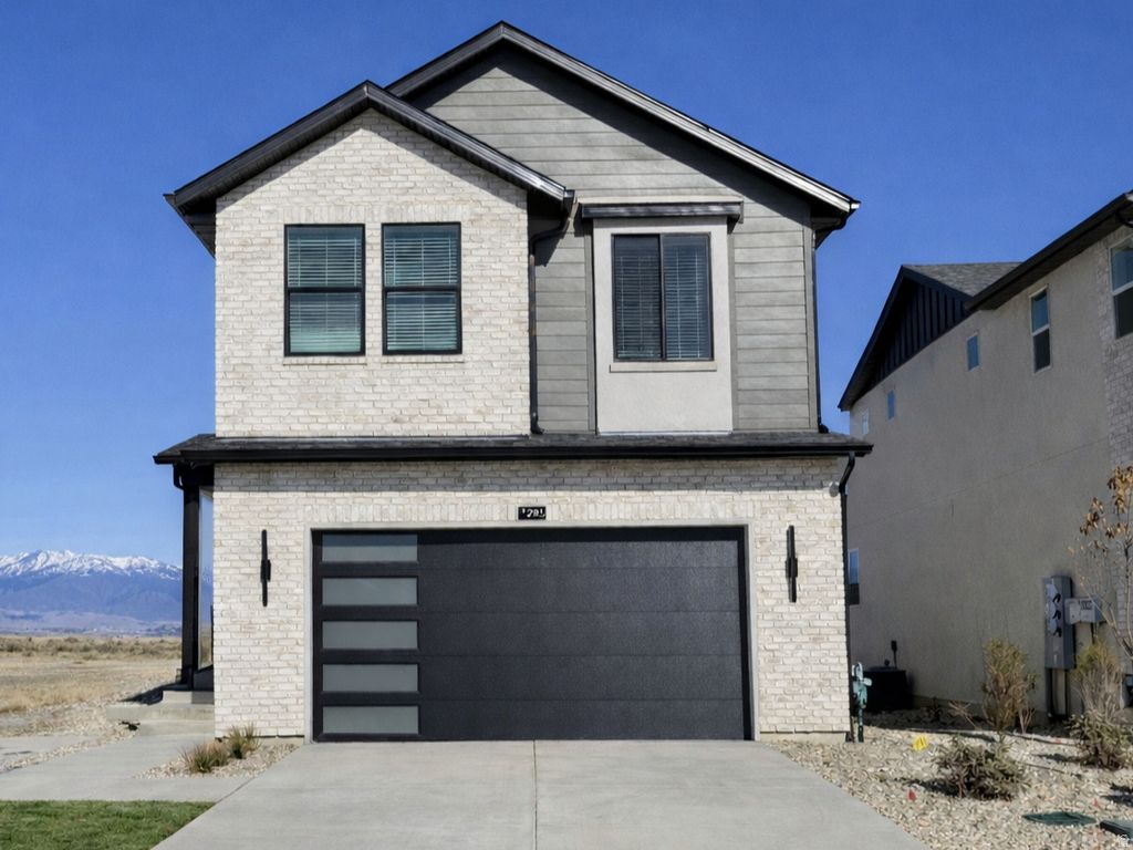 Photo of 6717 S VAUGHN LN #9, Midvale, UT 84047 (MLS # 2140110)