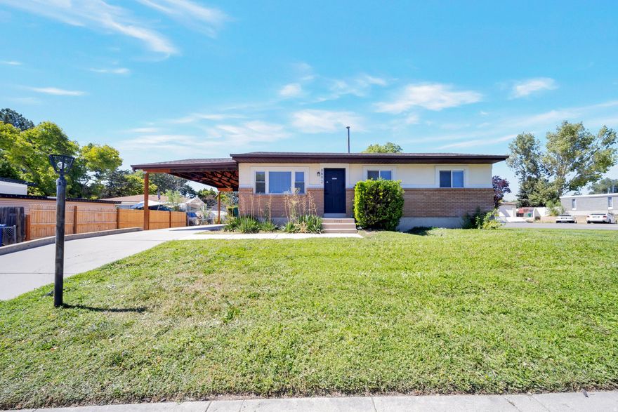 Stop looking - this is the one! Radiating modern style and unmatched livability, this 5-bedroom, 2-bathroom stunner sits perfectly on a .16-acre corner lot. The home's unique position offers the best of both worlds: front-facing main road access for a seamless commute, while the side opens into a quiet cul-de-sac where kids can play safely.   Experience the ultimate open-concept flow on the main level, featuring three spacious bedrooms and a layout built for hosting. Need more room? The basement offers two additional bedrooms, a second massive living area, and a smartly designed laundry room equipped with a dedicated folding and pre-washing station.   With 1,900 sq ft footprint and deep RV parking that comfortably fits two vehicles, this home offers the versatility and commuter-friendly location you've been craving in the heart of West Jordan. This is a rare find-see it today before it's gone!