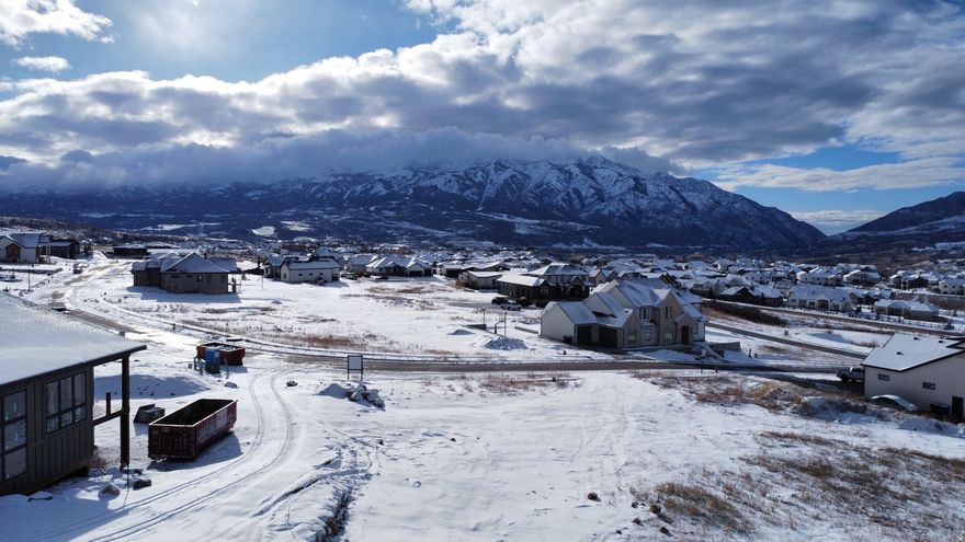 Build your dream home in the beautiful Cottonwoods at Mountain Green Planned Community. Plans are already drawn for the lot to optimize views. This lot is fully improved with culinary water, secondary water, sewer, gas, power, and high-speed internet.
