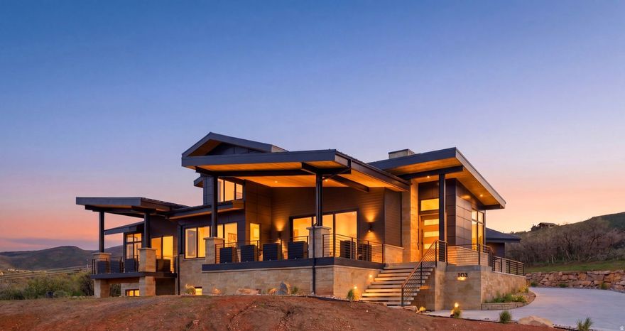 Enjoy elevated mountain living in this exceptional Hideout retreat perched above the Jordanelle with sweeping views of Deer Valley and Mt.Timpanogos. Newly completed and beautifully furnished, this custom mountain contemporary home oers three levels of thoughtfully designed living space where every window captures a postcard-worthy backdrop. Designed with comfort and functionality in mind, the home features approximately 2,600 square feet of main-level living, creating the ease of a true single-level lifestyle without sacrificing space for family or guests. The main floor includes a stunning primary suite, dedicated oce with dual workstations, expansive great room with fireplace, powder bath, laundry, and a chef's kitchen outfitted with professional-grade appliances, oversized island, wine fridge, and generous dining area. Walls of glass open to a spacious view deck ideal for morning coee, aprs-ski gatherings, or sunset entertaining. The upper and lower levels provide flexibility for hosting and multi-generational living. Upstairs, a cozy sitting room framed by spectacular views connects two spacious ensuite guest bedrooms. Downstairs, entertainment takes center stage with a large family room, wet bar, game area, sauna, flex space ideal for a gym or movie room, an oversized ensuite guest suite, and a fun custom bunk room. Outside, enjoy landscaped outdoor living spaces and a private hot tub on an expansive back deck. A sophisticated blend of stone, wood, and metal complements the surrounding landscape, while practical luxuries include central A/C, three furnaces, and a 3-car garage ready for all your mountain gear. Located just 12 minutes from Deer Valley East Village, 17 minutes to Historic Park City Main Street, and 45 minutes from Salt Lake International Airport, world-class skiing, golf, boating, biking, hiking, and fishing are all moments away. This is mountain living at its finest-elevated, eortless, and designed for both relaxation and adventure.