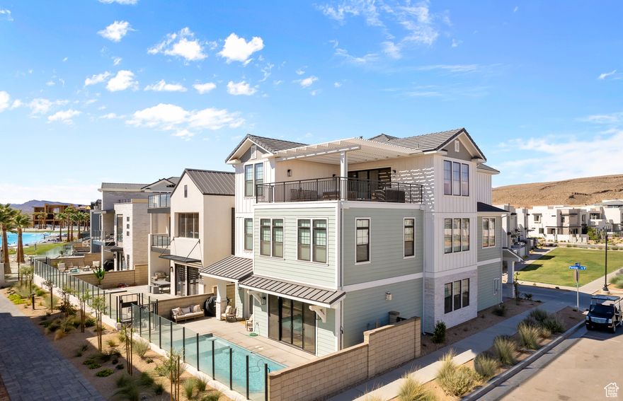 This home is being sold as a 1/8th Co-Ownership home. The price reflects the 1/8th ownership share price. Monthly operational costs are estimated at $565 per month per 1/8th Ownership share. Call for a breakdown of costs. Located on the boardwalk, just steps away from the white sand beach at the 2.5 acre lagoon and luxurious amenities of Desert Color. This home features a Private Pool, a Gourmet Kitchen, 6 Master Bedrooms, 2 Bunk Rooms, 3 Family Rooms, a sprawling dining area that seats 25+ of your friends and family, a 440 sq. ft. Party Deck w/firepit, and a Private Pool Deck on the Lagoon boardwalk. Each bunk room features 3 sets of bunkbeds, plus 3 trundle beds for a total of 9 beds per bunk room. At roughly 2.5 acres of surface area and a half-mile of white-sand shoreline, this home is just steps away the largest private lagoon in Utah. The lagoon is the perfect place to swim, kayak, paddleboard, and much more. Walking/biking trails are already completed and ready for your use. This home comes fully furnished and decorated by a professional interior designer and turnkey for incredible Southern Utah living. Square footage figures are provided as a courtesy estimate only and were obtained from Builder records.  Buyer is advised to obtain an independent measurement.