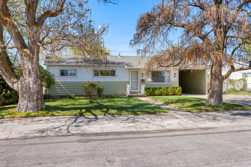 ***OPEN HOUSE THIS WEEKEND! SATURDAY, APRIL 11 FROM 11AM to 2PM.*** Charming rambler in the heart of Kearns offering timeless character and inviting feel throughout. This well-maintained home features a functional layout with full basement, including cozy family room and additional bedrooms, providing comfortable living space on both levels. The basement also includes a versatile third room ideal for an office or additional living area. Lovingly cared for over the years, the home retains its original vintage charm while offering great potential for future updates. A walkout basement entrance adds convenience and accessibility, and the backyard features a covered concrete patio, perfect for relaxing or entertaining. The fully landscaped, fenced yard with mature trees creates a private and usable outdoor space. Additional highlights include ample parking and a location within an established neighborhood close to parks, schools, shopping, and major commuter routes. This home is ready for its next chapter and offers a great opportunity for the next owner. Sold as-is. Info deemed reliable; buyer/buyer's agent to verify all. Square footage figures are provided as a courtesy estimate only obtained from tax records.