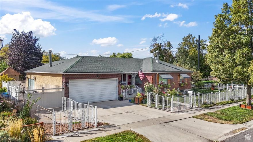 Beautiful brick home in Rose Park! An absolute rare find! With an award-winning yard (voted "best yard in the neighborhood" multiple years!) and permanent exterior lighting you'll have year-round curb appeal. Minutes from downtown SLC and across the street from a small park. Inside this home features a massive family room, a formal dining area just off the kitchen and so much timeless charm. The basement has a private entrance and second kitchen making it perfect and ready for a potential basement apartment. Enjoy RV parking, a two-car garage, and even a separate shed so you have plenty of space for all your cars and toys. 9ft privacy walls around the backyard, a custom iron fence around the front, natural gas BBQ, custom landscaped pond/stream and a fire pit all give you so much to enjoy and entertain friends outside this home.   Square footage figures and all information are provided as a courtesy estimate only. Buyer/Buyer agent is advised to obtain an independent measurement and verify all.