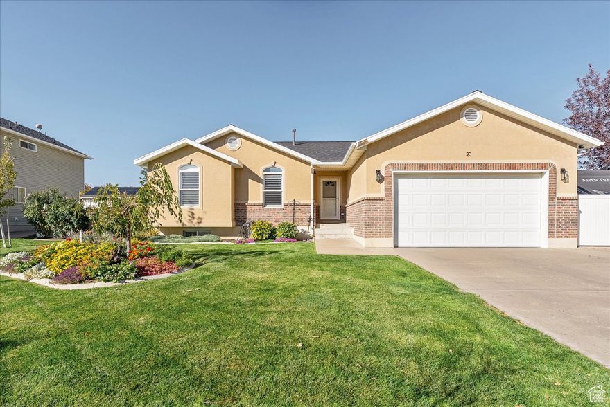 This beautiful fully updated East Layton rambler features 5 bedrooms, 3 full baths, and a spacious finished basement-perfect for entertaining or relaxing with family and friends. The home sits on a fully landscaped lot bursting with color and life, with thoughtful plantings that make every season shine.  In the front yard, you'll find peonies, bleeding heart, snow-in-summer, and roses, along with a Pixzee miniature peach tree that produced an impressive crop of sweet peaches this year. Additional plantings include lilies, tulips, lavender, dahlias, and a dwarf weeping cherry tree that adds charm and shade.  The backyard continues the garden experience with more peonies, irises, and flowering ground cover, creating a peaceful retreat. Along the back fence line, a row of lilac bushes in varying shades of deep and light purple adds privacy and incredible spring fragrance.  Inside, you'll find an open layout, custom pantry shelving, laundry on main floor, and plantation shutters. For peace of mind, the roof was replaced in 2023, and it offers a newer furnace and water heater (2017).  Located just 1 mile from Hill Air Force Base (South Gate), 30 minutes from Snowbasin Resort, and minutes from hiking trails, this home perfectly blends comfort, convenience, and natural beauty-truly a gem in East Layton.