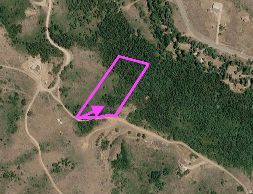 25 Min drive from Ogden City. Tucked away in the high country near PineView Resevoir, this 2.19-acre recreational/residential lot offers a rare mix of privacy, open space, and panoramic beauty. The property sits in an elevated position, delivering sweeping 360-degree views of surrounding mountain ridgelines, forested slopes, and big Utah skies-ideal for sunrise coffee and stargazing nights.  The land is well-suited for a weekend getaway or future cabin build, with enough acreage to create a secluded retreat while still having room for outdoor living-think fire pits, a small workshop, or space for RV access. The natural terrain features a blend of native vegetation and open clearings, giving you flexibility in choosing a build site that maximizes both views and shelter.  Located within reach of Wasatch Mountains recreation, the area is known for hiking and ATV trails in summer, and snowmobiling or backcountry near skiing in winter on Snow Basin. Despite its peaceful, off-the-grid feel, it remains accessible enough for practical development, making it a strong option for those wanting a balance between escape and usability.  Whether you're planning a rustic cabin, a seasonal basecamp, or simply a quiet place to unplug, this lot offers the kind of space and scenery that's getting harder to find.