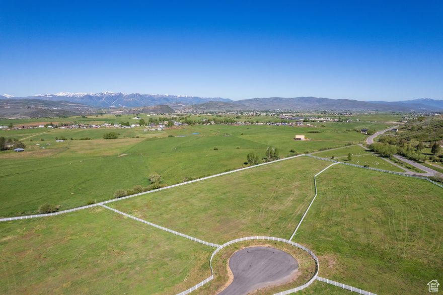 Discover a rare opportunity to own land in one of the most peaceful corners of Kamas Valley. Located just minutes from Park City, Stewart Estates offers only four 5-acre estate-style lots in a secluded yet accessible setting. These expansive parcels are equestrian-zoned and ready for your dream home - whether that's a mountain modern retreat, a legacy ranch, or a timeless farmhouse.  With sweeping views, open skies, quick river access, and a quiet landscape, Stewart Estates offers a lifestyle that's both grounded and inspiring. Wake to sunrise over the Wasatch Range and spend your days in connection with nature, family, and the land itself. This is a place for those who value space, freedom, and privacy - without sacrificing access to the amenities and energy of nearby Park City.  Developed by the visionary behind Wolf Creek Ranch, Stewart Estates blends thoughtful planning with natural beauty. With endless trails for hiking and outdoor recreation, an elegant entry monument, and perimeter fencing add to the neighborhood's character and charm.  Whether you're seeking open land for horses, a basecamp for outdoor adventures, or a peaceful place to build your forever home, Stewart Estates offers a one-of-a-kind chance to live with intention in a truly special setting.