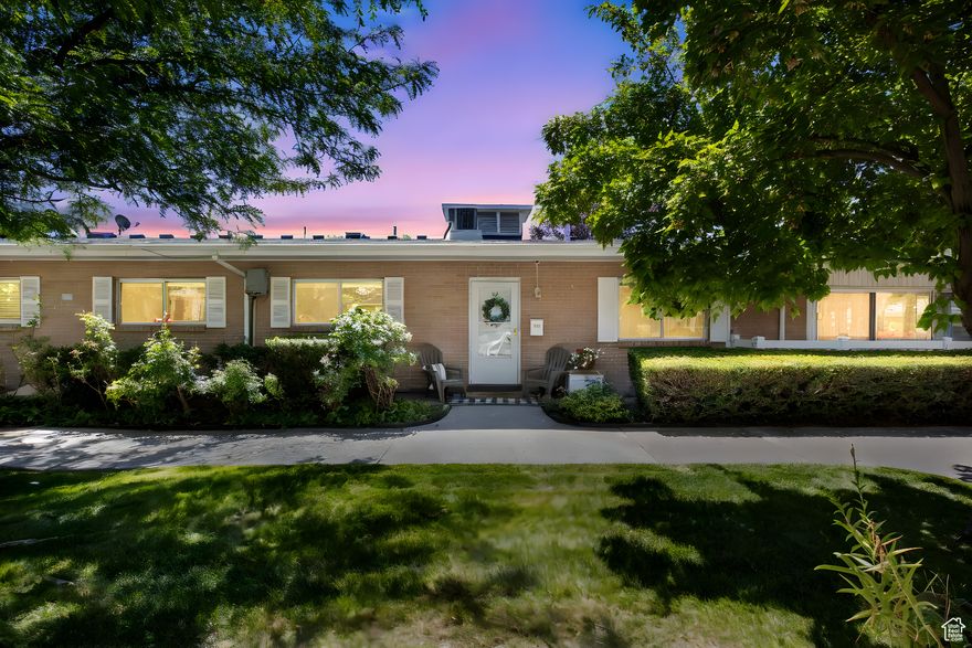 Welcome to Carriage Lane - one of Holladay's best-kept secrets! This rarely available end-unit condo is nestled in a quiet, gated community surrounded by mature trees, mountain views, and beautifully maintained grounds. With an ideal Holladay location with Holladay City Hall Park practically next door and Holladay Village down the street, this home offers both privacy and convenience.  Step inside to large floor-to-ceiling windows overlooking green space, a beautiful fireplace, and built-in shelves. Enjoy a thoughtfully designed layout featuring main-level living, generous entertaining spaces, and a bright kitchen. The spacious primary bedroom includes a walk-in closet.   Carriage Lane Condominium HOA covers the common area expenses including the security gates, landscaping, lawn care, snow removal, trash removal, clubhouse, gym room, and outdoor swimming pool. Water, sewer, and garbage expenses are also included. Exclusively designated, covered parking space and a private storage room (approximately 10 X 10 ft). Nearly next door are pickleball courts, playground, and a skatepark at Holladay City Park. Just minutes from canyon trailheads and located within Driggs Elementary, Olympus Jr., and Olympus High boundaries.   These units don't come up often-don't miss your chance to live in one of Holladay's most desirable condo communities!  Square footage figures are provided as a courtesy estimate only and were obtained from tax data.  Buyer is advised to obtain an independent measurement.