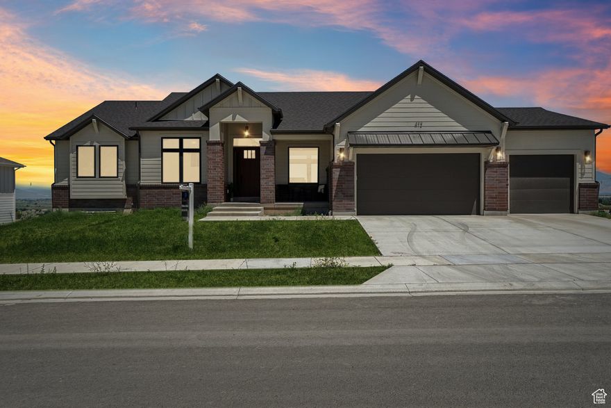Open houses: 6/14 4:00-6:30pm & 6/21 5-7pm Seller is offering a 10K incentive to be used at the buyer's discretion! Nestled in the scenic foothills of Mount Loafer, this Elk Ridge gem offers the best of both worlds: modern comfort and unbeatable outdoor adventure. Step inside to discover an open-concept main floor designed for effortless entertaining, complete with an elevator providing convenient access to the walkout basement. This new home boasts numerous upgrades, see attached list for details, but highlights include a gourmet kitchen featuring granite countertops, a gas range, a vented microwave, and ample cabinet space, including storage under the island. You'll love the oversized pantry with a dedicated "Costco door" leading directly into the garage for easy unloading. The main level offers two spacious bedrooms, with sound insulation between the great room and the primary suite, and the lower level has an additional three bedrooms, second laundry hookups, separate HVAC system, soft water rough in, Radon system, and plumbing for a future kitchen-perfect for a private guest suite or multi-generational living. Enjoy seamless indoor-outdoor entertaining with gas lines stubbed on both the deck and lower patio for your grilling pleasure.  Outside, prepare to be captivated by sweeping mountain views and crisp canyon air. With easy access to hiking and biking trails, and just 5 minutes from Gladstan Golf Course, adventure is always at your fingertips. Explore the Nebo Loop Scenic Byway for a quick escape, or venture further to the Manti-La Sal National Forest or Canyonlands National Park. Elk Ridge is a true haven for nature lovers, offering fantastic opportunities for fishing, ATV riding, camping, and unforgettable autumn drives.  Enjoy the peaceful, small-town feel of Elk Ridge, all while being just minutes from Provo's city amenities and a mere 10 minutes from your nearest grocery store. This home offers the perfect balance of serenity, space, and adventure. You don't want to miss out on this opportunity!