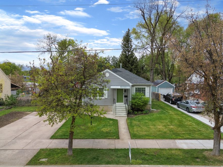 Don't let the 1940 build date fool you-this home has been completely revitalized with a full facelift while still preserving its timeless charm. Warm, inviting, and full of character, it offers the perfect blend of classic appeal and recent updates.  Inside, you'll find a beautifully updated kitchen, new flooring throughout, fresh paint, and a comfortable layout. Situated on a generous .27-acre lot, there's plenty of room to relax, garden, or entertain.  Located in the highly sought-after Historic Island neighborhood, this home offers a true sense of community in a family-friendly setting. Enjoy the convenience of being just 2 blocks from Island Market, 1.5 blocks from Wilson Elementary, and close to Merlin Olsen Central Park.  You'll also appreciate easy access to Logan's most beloved attractions, including the American West Heritage Center, First Dam, Ellen Eccles Theatre, and the Nora Eccles Harrison Museum of Art. Plus, enjoy local favorites like famous Aggie Ice Cream, the Cache Valley Cruise-In, the Cowboy Rendezvous, and the Cache Valley Cheese & Dairy Festival.  This is a wonderful opportunity to own a thoughtfully updated home in one of Logan's most charming and convenient neighborhoods!  Seller has already purchased an Acclaimed Homw Warranty for the buyer.  This is their Ultimate Plan that costs $700.  Listing agent is relataed to the seller.