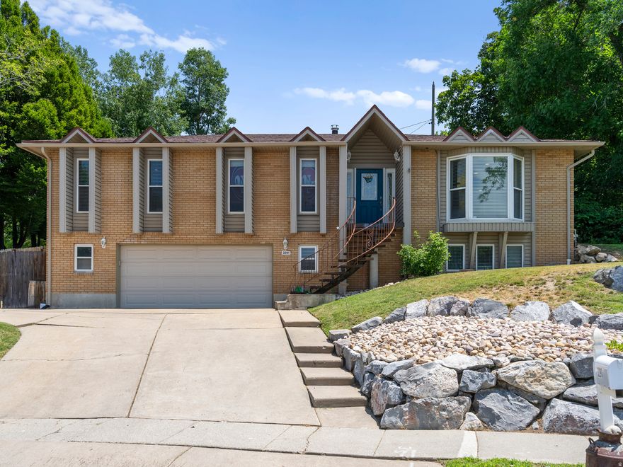 OPEN HOUSE Saturday April 11th, 2026 from 11-2pm. Welcome to this beautifully maintained 5-bedroom, 2 1/2-bathroom home in a desirable area called Bountiful. It has an open-concept layout where the spacious living room seamlessly flows into the kitchen, perfect for everyday living and entertaining. The kitchen features a stylish backsplash and plenty of counter space, with a dedicated laundry room nearby for added convenience. The fully finished basement offers additional living space, ideal for a growing family or guests. Enjoy both a covered and open patio overlooking the fully fenced backyard, covered in greenery. A great backyard for children, pets, and outdoor gatherings. Surrounded by natural beauty and located in a peaceful community, this home offers comfort, space, and charm. Come see it for yourself-your next home awaits in Bountiful!