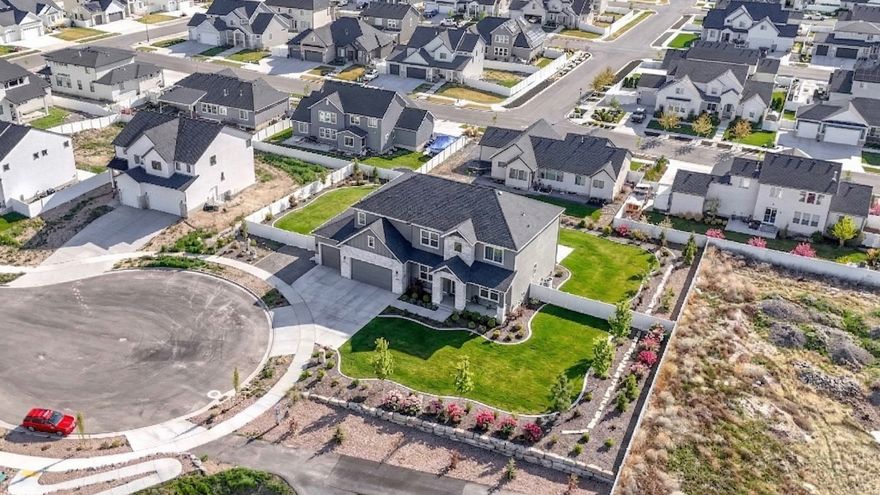 This one-of-a-kind west-facing court lot offers the perfect canvas for your dream custom home. Nestled in a welcoming, established neighborhood with a high-end feel and tree-lined streets, this is a rare opportunity to secure one of the most coveted locations-complete with no through traffic and close proximity to the community park. Enjoy breathtaking panoramic mountain views along with the convenience of nearby shopping and dining, making everyday living both scenic and effortless. The lot has been freshly graded and is ready for your builder of choice to bring your vision to life-creating what could easily become the premier home in the neighborhood. An added bonus: the adjacent lot is also available, offering potential to expand your footprint, add additional garage space, or create an even more expansive custom estate.  BUYERS & BUYERS AGENTS TO VERIFY ALL INFORMATION GIVEN, GIVEN AS A COURTESY ONLY. MOCK/STAGED PHOTOS SHOW POTENTIAL "TO BE BUILT" OPTIONS. SOME PHOTOS INCLUDE POTENTIAL OF LISTED SMALLER LOT NEXT DOOR AS AN INCLUSION. TRUE PROPERTY LINE OF LOT PROVIDED AS WELL.