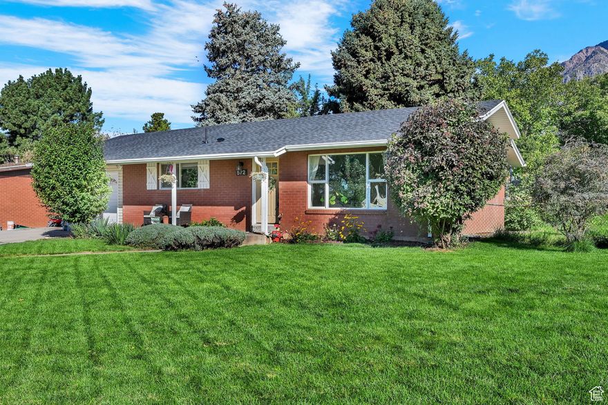*NO SHOWINGS UNTIL OPEN HOUSE (Saturday 11-1 PM)* Welcome to your move-in ready home in a beautiful North Ogden neighborhood. Situated on a beautiful corner lot with stunning mountain views, this 1,850 sq ft home, garage and shop, offers true peace of mind. The major updates are done! A new roof with a 50-year transferable warranty (2024), Lennox furnace/AC system (2021) also includes a transferable warranty and new carpet upstairs (2020). The kitchen has been beautifully upgraded with granite countertops and soft-close cabinets. Enjoy a spacious basement with large family room and fantastic walk-in closet. The property is a hobbyist's dream, featuring a massive 32'x34' two-story shop with 120V & 230V service. With fiber internet, a full sprinkler system, and a large dog run, and covered patio, this home is the complete package. Outside, enjoy a bounty from mature peach, apple, and nectarine trees, plus large raspberry and blackberry bushes.  Don't wait-schedule your showing today!