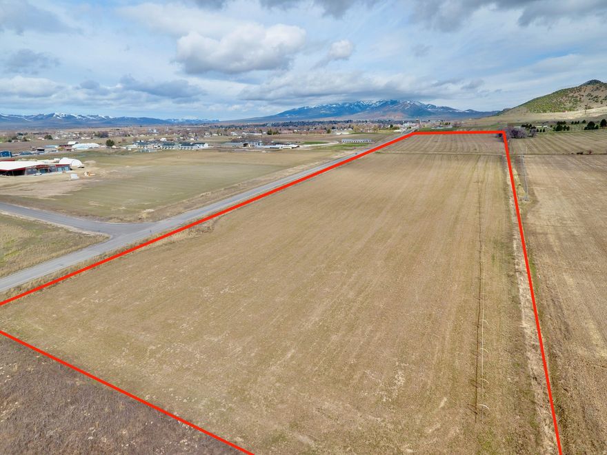 Potential investment opportunity within Malad City limits. This 41 acre parcel sits just 0.4 miles from the I-15 exit, offering prime access and visibility. Surrounded by new school, county, and residential projects, the area is poised for continued growth. It has access to three-phase power, city-maintained road frontage, and is currently zoned residential. This is a rare chance to secure significant acreage in the path of progress.