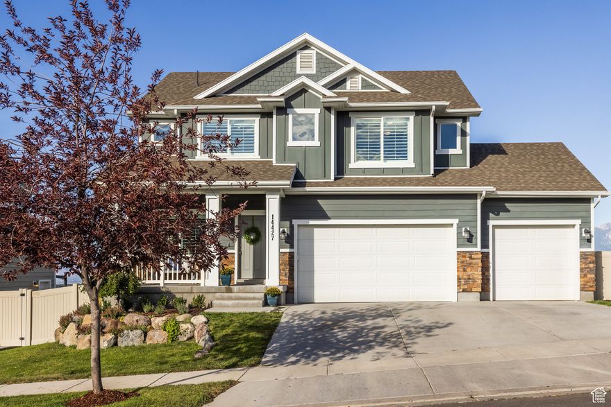 Gorgeous Two-Story Herriman Home with Stunning Views & Income-Generating ADU! Welcome to this beautifully maintained 4-bedroom, 4-bathroom home in Herriman, perfectly situated to capture views of the Wasatch Mountains and valley. As you enter, you're greeted by a versatile space that can serve as a formal living room or home office. The open-concept main level features a spacious family room and a kitchen with white cabinetry, granite countertops, stainless steel appliances, a pantry, and a built-in water filtration system. Upstairs, enjoy a bright loft area-perfect for a second lounge area, playroom, or additional office space-as well as the convenience of an upstairs laundry room. Spacious primary bedroom and ensuite with amazing views of the valley and Wasatch Mountains. Two other bedrooms are located upstairs. First and Second floor has BRAND NEW CARPET. The fully finished walkout basement offers a private 1-bedroom, 1-bathroom Accessory Dwelling Unit (ADU) complete with its own family room and kitchenette. The sprinkler system that has a smart box controlled via B-Hyve app (Bluetooth).  The garage door is connected through MyQ app.