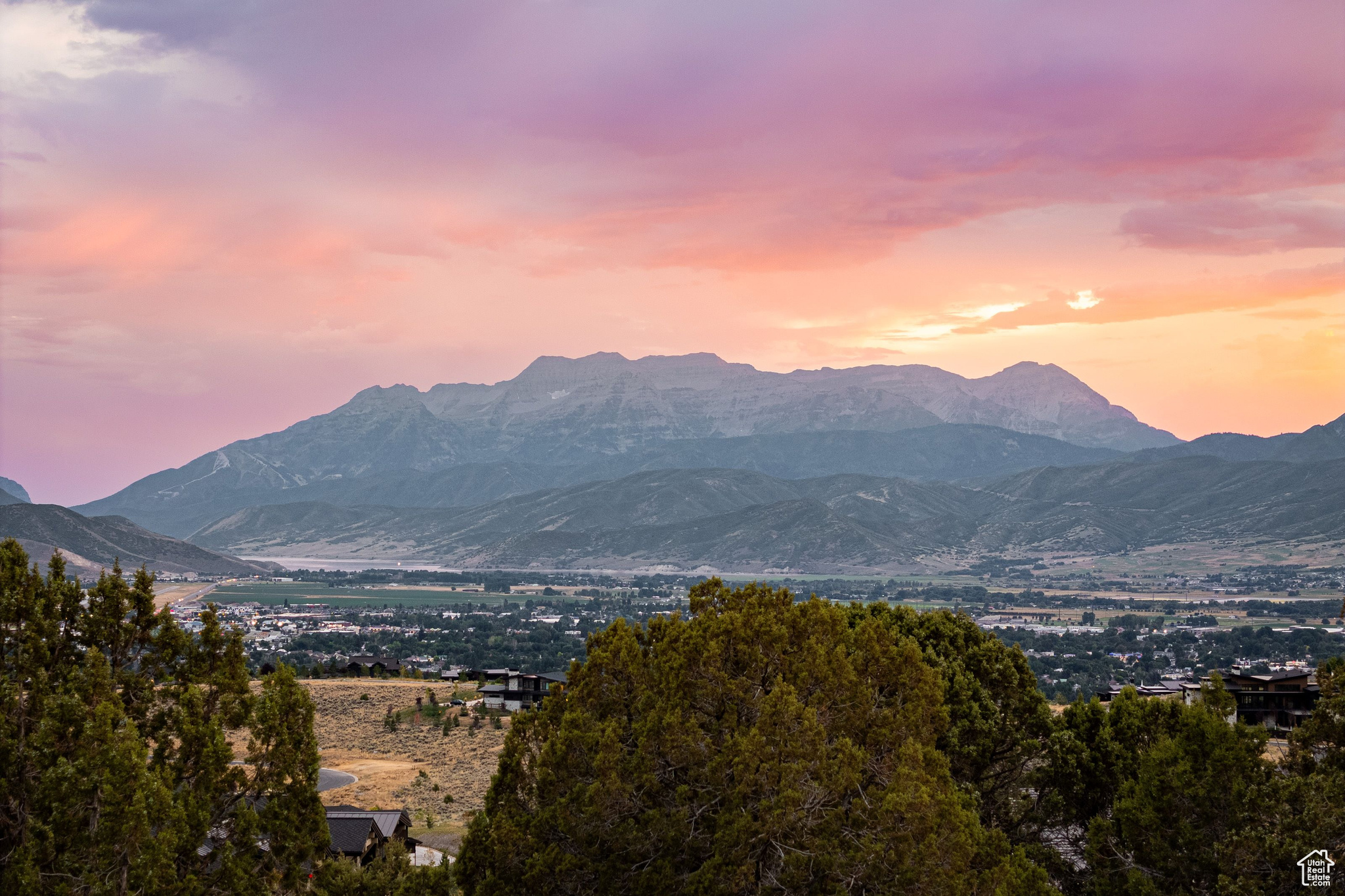 Welcome to Red Ledges, an exclusive private community where luxury mountain living meets world-class golfing. Set against the breathtaking backdrop of Utah's scenic Heber Valley, this custom homesite presents a rare opportunity to design and build your ideal retreat in one of the region's most prestigious settings. Situated on over two-thirds of an acre, the property features a gentle downhill slope, ideal for creating a spacious, thoughtfully designed residence that takes full advantage of the surrounding views. With a full Golf Membership to the Red Ledges Club available (separate deposit required), you'll enjoy access to year-round amenities, including the Jack Nicklaus Signature Golf Course and Golf Park, state-of-the-art fitness and wellness facilities, pools, tennis, pickleball, and an unmatched lifestyle at the heart of the community. This homesite offers the perfect combination of location, privacy, and lifestyle - a place to build your vision and experience the very best of Red Ledges living.