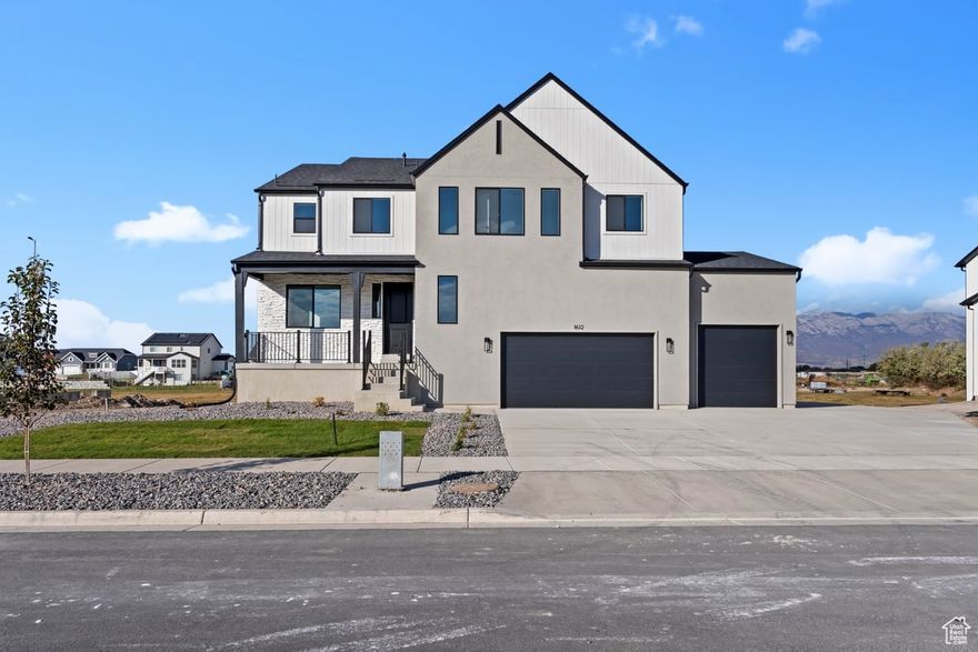 *Quick Move In* Located on the border of Lehi and Saratoga Springs, this exquisite 6-bedroom Willow floor plan is hard to beat.   The walk-out finished basement with a spacious 2-bedroom ADU is truly a sight to behold. Situated near pristine outdoor activities such as the El Nautica Boat Club, Talons Cove Golf Course, Israel Canyon Trailhead, and Saratoga Hot Springs, North Lake Meadows offers a convenient location close to amenities like Costco, Wal-Mart, and more. Featuring a extra deep 3 car garage, substantial Butler's Pantry, double oven, and gas cooktop, this home boasts an open-concept great room ideal for entertaining. With luxurious touches like a large primary tub and shower, cultured marble finishes, quartz countertops, and modern railing, this Willow Floor plan exudes sophistication and elegance.   Sq ft per builder specs.  Buyer to approve and certify ADU with their local jurisdiction. Model home is the same plan.  This home is completed!