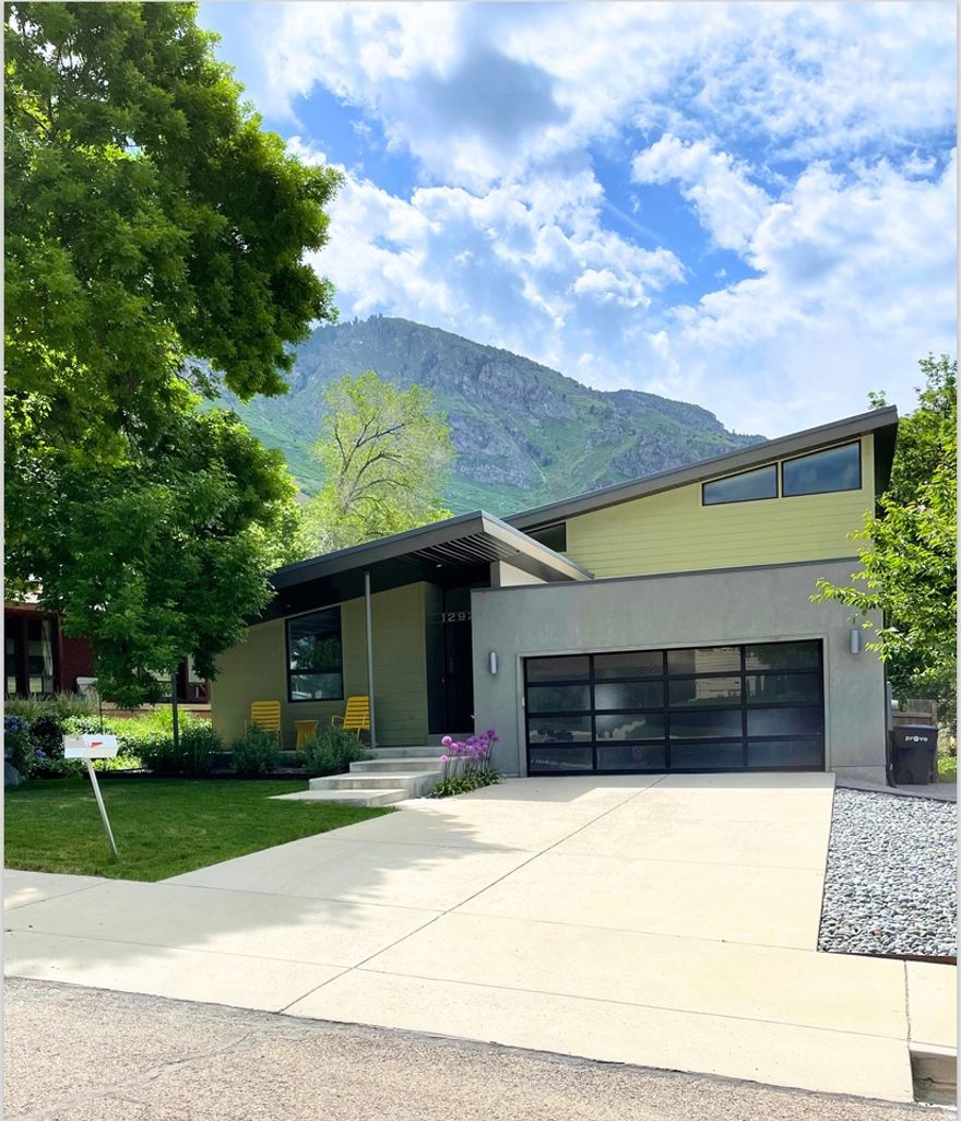 Uniquely spectacular home in the perfect neighborhood. Solar has 30 panels, was installed in 7/2020, and is wholly owned. 9.3Kw system estimated to produce 11,370Kw annually. System feeds back into Provo City power and offsets electrical needs. Seller will provide copies of recent bills with breakdown. Home was built to take advantage of passive solar heat in winter months. Main floor was plumbed during construction for radiant heat, though that system was not installed. Washer and Dryer are approximately 3-years old. Furnace has a humidifier. Heating & cooling systems are serviced annually by Western Heat & Air (once for furnace, once for AC). Basement rooms have blinds, master bedroom has vertical shades. Floor drains are located in the basement utility room and under the washer/dryer. Jetted tub in primary bath. Laundry chute in primary closet. Wall double-oven and microwave were replaced 11/2025. Wall oven is convection and has air fryer mode. Kitchen countertops are stainless and quartz. 2 mature trees in back, 3 in front including flowering (non-fruiting) cherry trees. Roof on home is standing seam metal roof, garage is membrane. Google Fiber. Small garden shed included. Provo Power, Water, Sewer, and Trash. Enbridge Gas.