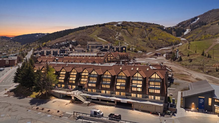 Located in the heart of Park City Mountain Village, this fully furnished and turn-key Resort Center condo offers an incredible opportunity to own at the base of Park City Mountain. With two bedrooms, two full bathrooms and 964 square feet, the residence is thoughtfully designed for comfort, convenience and year-round enjoyment.  The inviting great room is filled with natural light and features mountain-inspired finishes, a cozy fireplace and comfortable gathering space after a day on the slopes. The condo can sleep up to six guests and includes forced air, A/C, fresh new paint and a stackable washer and dryer for added convenience. Two hall storage units*, provide additional space for skis, snowboards, gear and personal items.  Step outside and enjoy exceptional ski access, with the ability to ski out to First Time, 3 Kings or Eagle chair lifts and ski back in with a short walk to the unit. Resort Center places you directly among the energy of Park City Mountain Village, surrounded by restaurants, shopping, ski shops and gear rentals.  Owners and guests enjoy access to Resort Center amenities, including a gym, year-round heated pool and hot tub, along with one unassigned underground parking space. Ideally positioned near Old Town and just minutes from Main Street dining, shopping and entertainment, this property is equally appealing as a vacation home, second residence or investment property. Nightly and long-term rentals are allowed, with the option to use your own property manager.  From winter ice skating and world-class skiing to summer activities including the Mountain Coaster, Alpine Slide, ZipRider, mini golf, climbing wall and mountain biking, this condo offers four-season Park City living in one of the area's most desirable resort locations.