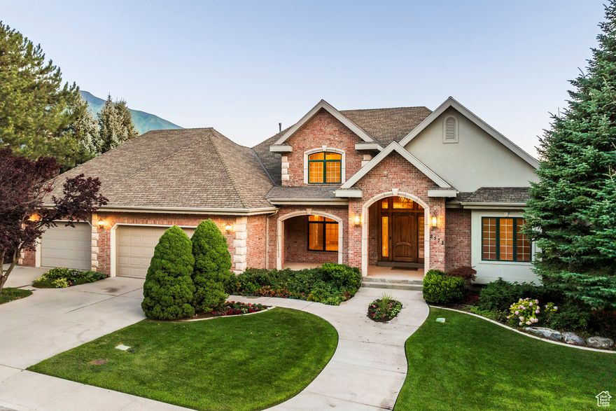 Exquisite 7,600 sq ft, 6-bedroom home with dramatic mountain and valley views from every level. Located on the east bench of Springville near Hobble Creek Canyon, this well-built custom home offers exceptional privacy and panoramic views. The main level features a two-story great room with huge windows and a chef's kitchen that opens to a large deck and landscaped patios-perfect for indoor-outdoor living. A formal dining room, living room, and spacious primary suite are also on the main level. Upstairs there are two bedrooms and a loft with a built-in desk, ideal for a homework or workstation. The fully finished lower level includes a large recreation room, wet bar, children's play area, exercise room, and three additional bedrooms, all with walk-out access to the backyard. An oversized garage and ample storage complete the home. Recent updates include new carpet, double ovens, and some fresh paint. This home has been really well maintained and the views really are spectacular. This is one you don't want to miss.