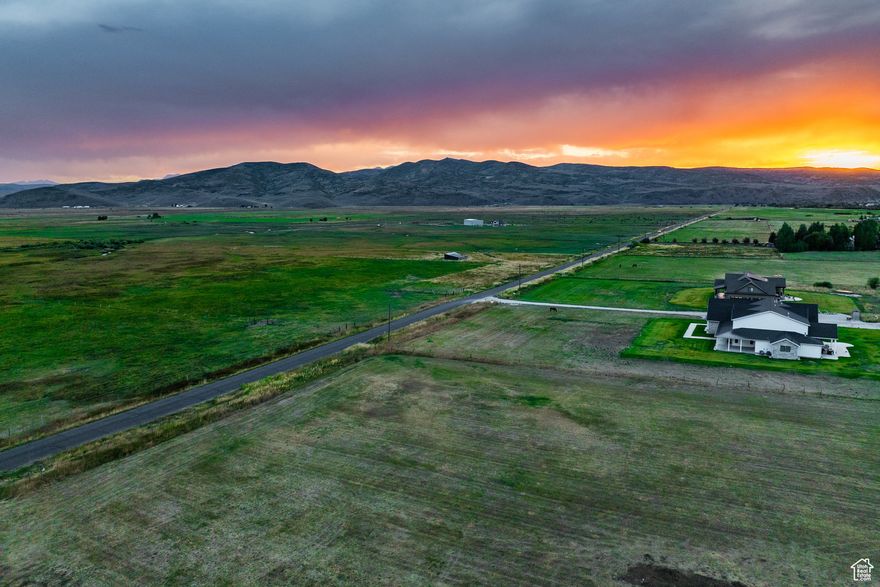 Nestled near Weber Canyon, this peaceful 2-acre parcel offers a rare opportunity to claim a piece of Kamas Valley-ideal for those craving open skies, mountain views, and a gateway to adventure. Whether you're looking to build a cozy cabin retreat or invest in your future homestead, this flat, usable lot is ready for your vision. Spend your mornings sipping coffee while deer wander the tree line, then hop on your side-by-side and head up Weber Canyon for a day at Smith & Morehouse Reservoir or fly fishing along the Weber River. With no HOA and agricultural zoning, you'll enjoy flexibility to create the lifestyle you want-whether that's a hobby farm, equestrian setup, or a custom country getaway. Utilities are nearby, access is easy, and the setting is nothing short of serene. Just 5 minutes to downtown Kamas and 20 minutes to Park City, this lot delivers both freedom and convenience. A truly rare chance to build something meaningful in the mountains.
