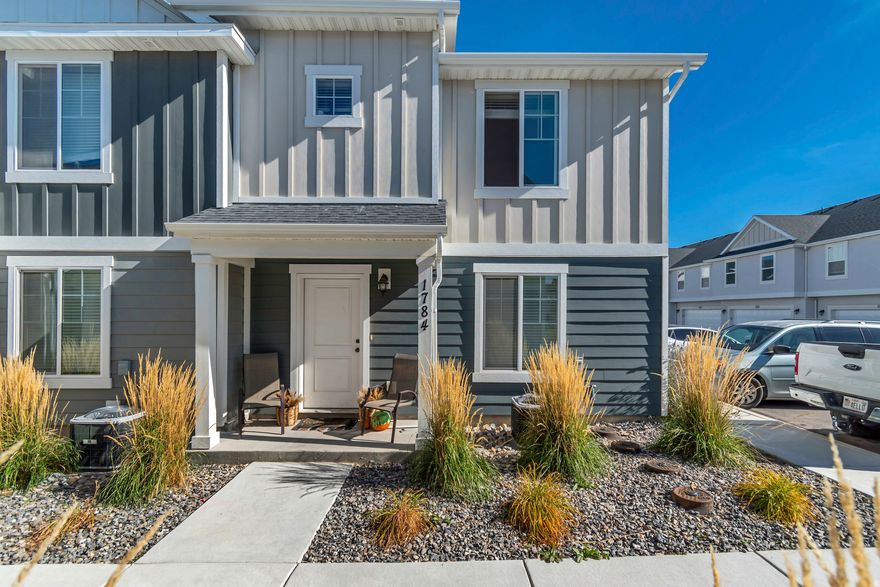 OPEN HOUSE this Saturday the 8th from 10-12pm!!! Welcome Home! This charming like-new end-unit townhome is the perfect blend of comfort, convenience, and modern style. Built in 2023 and lovingly cared for by its original owner, this 3-bedroom, 2.5-bath home feels fresh and inviting from the moment you step inside. Enjoy durable and stylish LVP flooring throughout the main level, cozy carpet upstairs, and an open, light-filled layout that makes entertaining or relaxing easy. The spacious kitchen flows beautifully into the living area, and the attached 2-car garage adds everyday convenience and extra storage space. Upstairs, you'll find a peaceful primary suite with a private bath and walk-in closet, plus two additional bedrooms and a full bath - perfect for family, guests, or a home office. Located in a friendly neighborhood just minutes from I-15, you'll love the easy access to shopping, dining, and recreation. Enjoy small-town charm with quick connections to Spanish Fork, Provo, and the rest of Utah County! Whether you're a first-time buyer, downsizing, or just looking for a move-in ready home that has it all - this townhome is a fantastic find.Sq footage figures are provided as a courtesy estimate only and were obtained from county records. Buyer is advised to obtain an independent measurement.