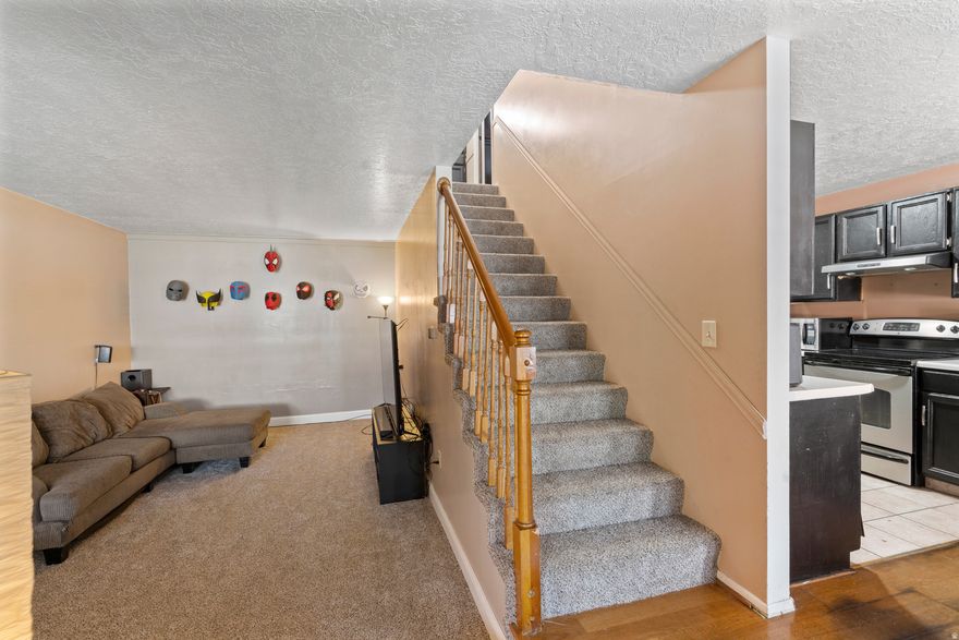 Well maintained townhome in a highly sought after Centerville location with mountain views and easy access to everything. Thoughtfully updated with BRAND NEW CARPET and a newer A/C, giving buyers a solid head start on both comfort and big ticket items.  The layout offers multiple living spaces including a sunken living room with great natural light, plus a functional kitchen with stainless appliances, and a dedicated dining area. Upstairs you'll find well sized bedrooms, including a primary suite connected to the full bath.  Step outside to a covered and fully fenced patio, perfect for low maintenance outdoor living. Community amenities include a pool and tennis courts, adding even more value to the lifestyle here.  Clean, cared for, and in a location that consistently holds demand.