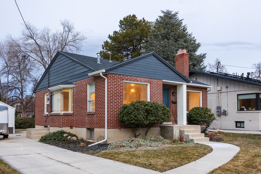 This cottage in Millcreek is no exception-you'll find plenty of charm inside, along with a remodel that's modernized the home and added convenience to everyday life. We're drawn to the aesthetic choices throughout. Primary living spaces here feel welcoming, with a fireplace in the living room and a flood of natural light. The brand-new kitchen is bright and functionally efficient-complemented by a cozy and practical breakfast nook, it's the ideal spot for both a cook-off and a casual game of cards. Gorgeous wooden floors throughout the second level lend warmth, and a fully remodeled bathroom offers a small sanctuary for both residents and guests. The back yard here is roomy and fantastic as-is, but essentially a blank slate, so it's yours to create the outdoor sanctuary you've always dreamed of. As far as location is concerned, this neighborhood is highly sought-out: luxurious properties abound here, and you're conveniently located at the base of the Wasatch mountains, which means quick access to both Big and Little Cottonwoood Canyons, as well as Millcreek Canyon. Moreover, I-215 and I-15 can get you where you need to go in a flash. Our advice? Don't let this one slip away.
