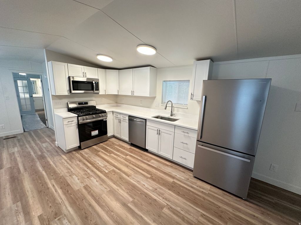 Photo of 706 W MONTE AZUL DR #120, Taylorsville, UT 84123 (MLS # 2133570)